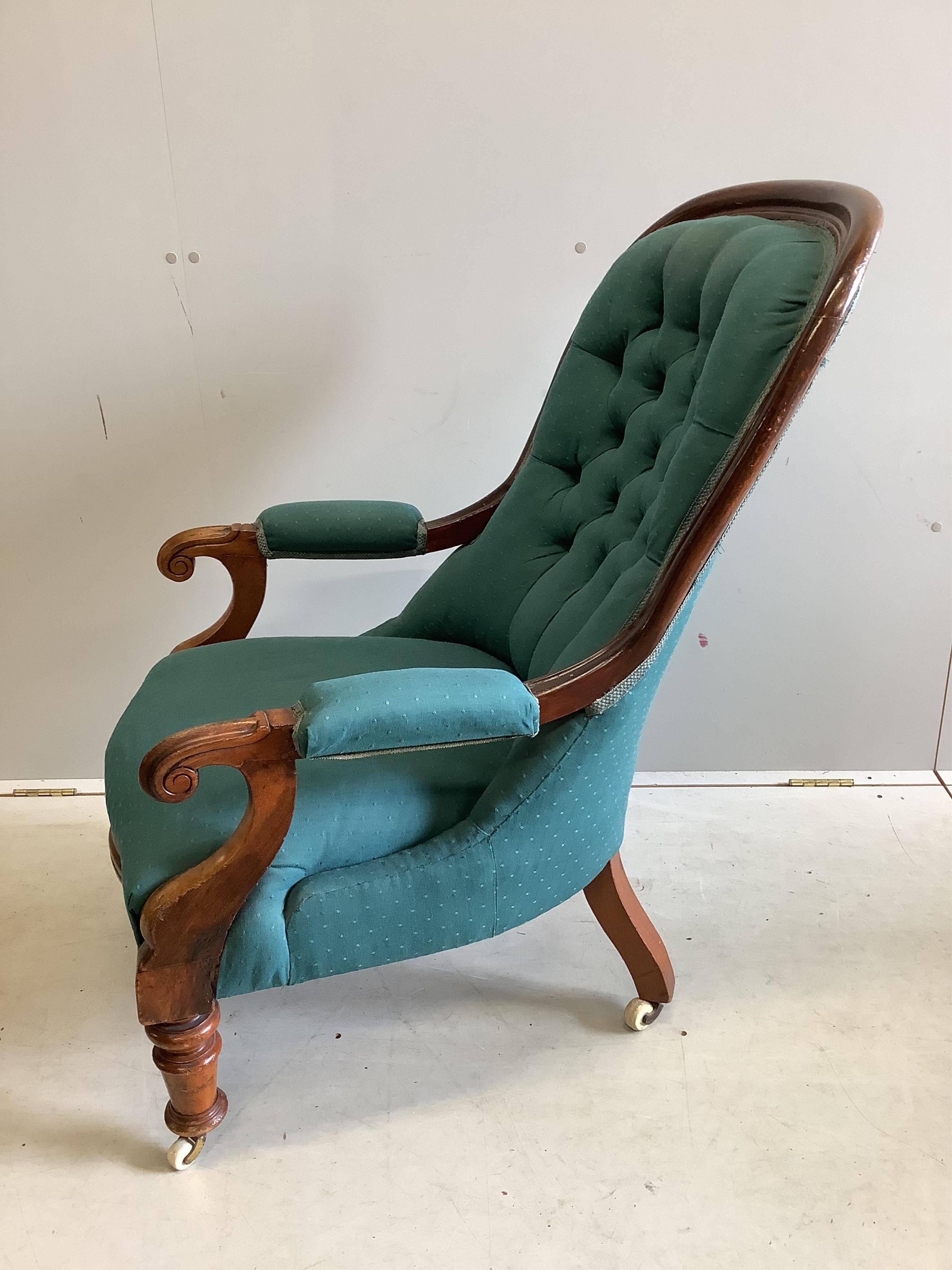 A Victorian upholstered mahogany spoon back open armchair, width 68cm, depth 78cm, height 99cm. Condition - fair